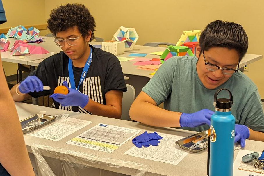 Two pipeline students on the scrubs camp