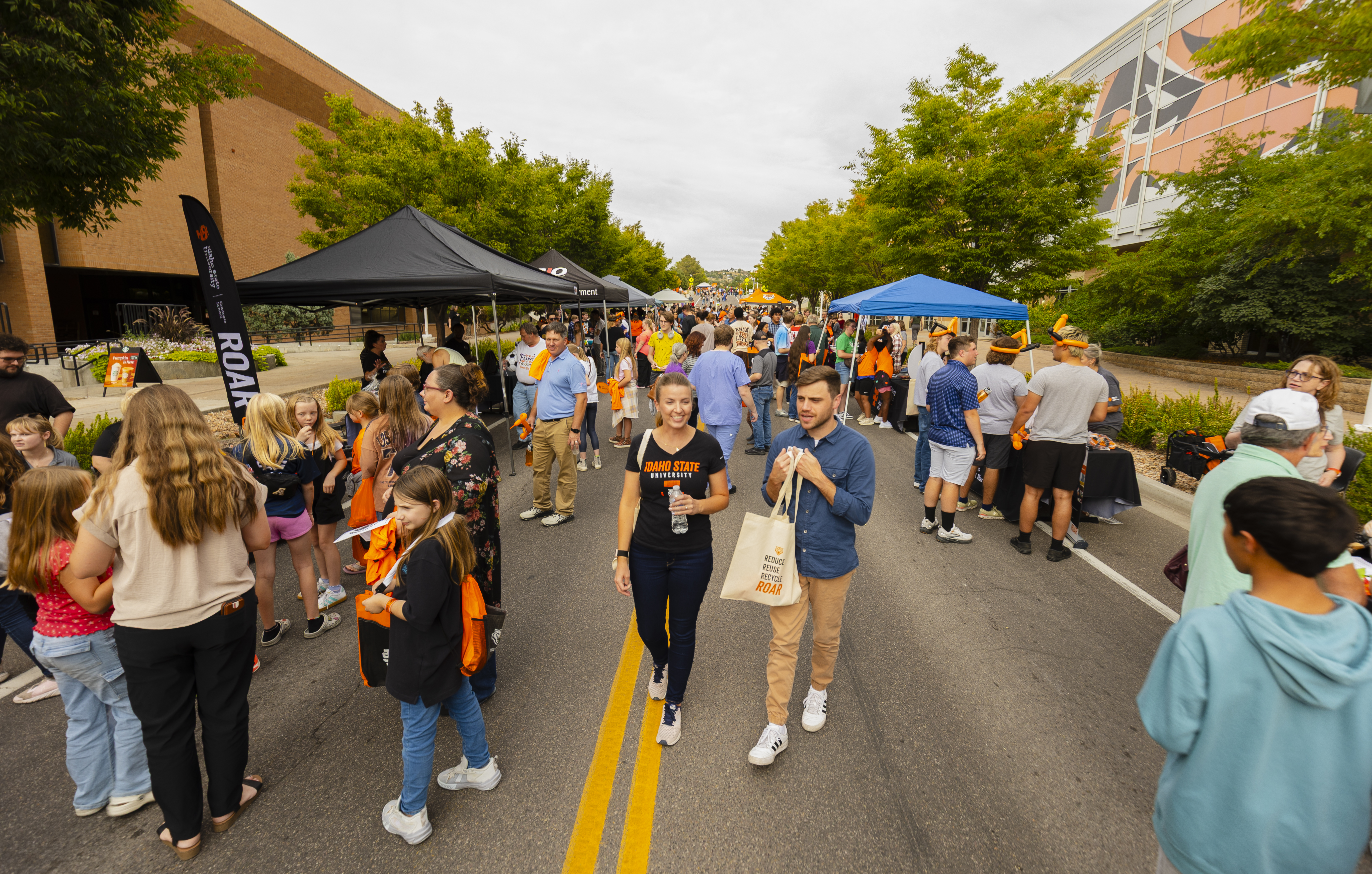 Families walking through the street party