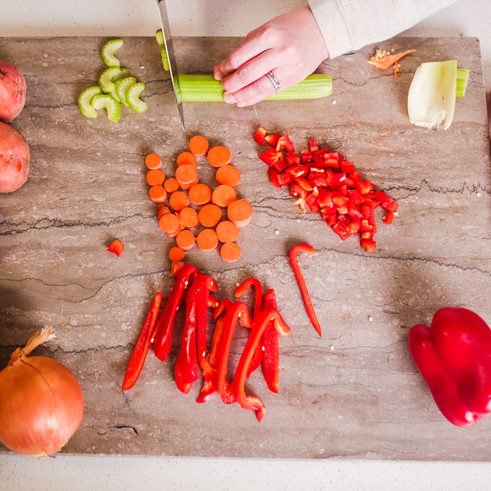 Food being chopped on a cutting board