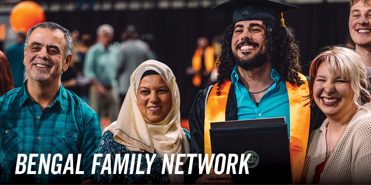 Student with Family at Graduation