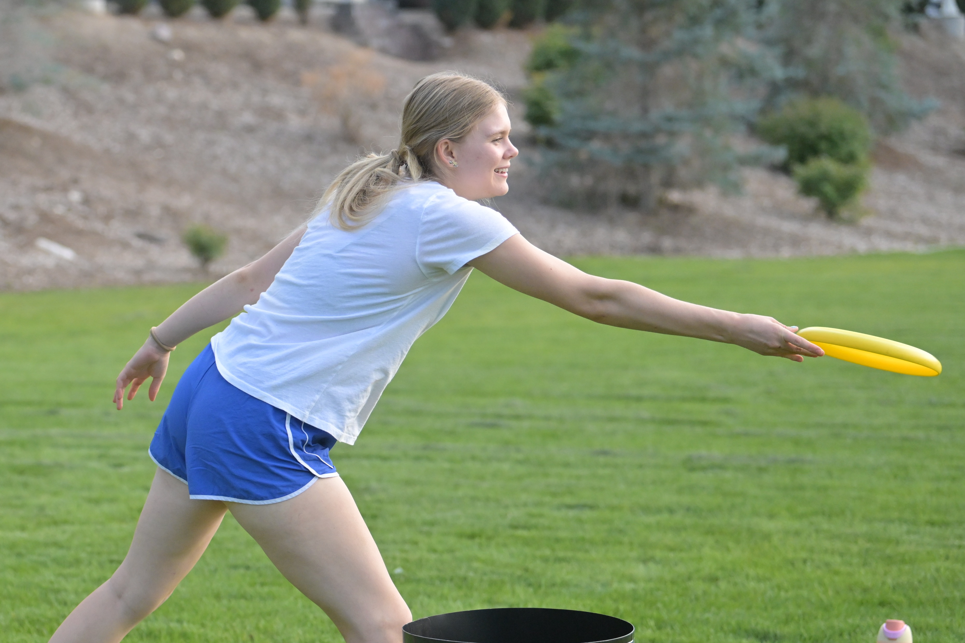 Student throwing a frisbee