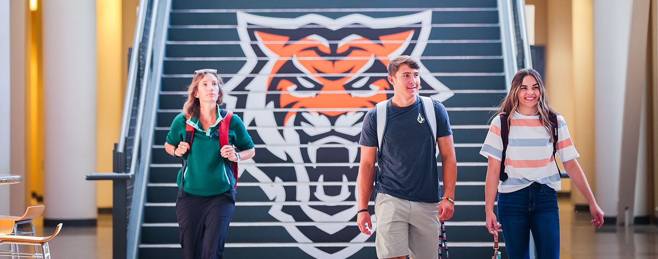 Students walking down the stairs in the Rendezvous Building