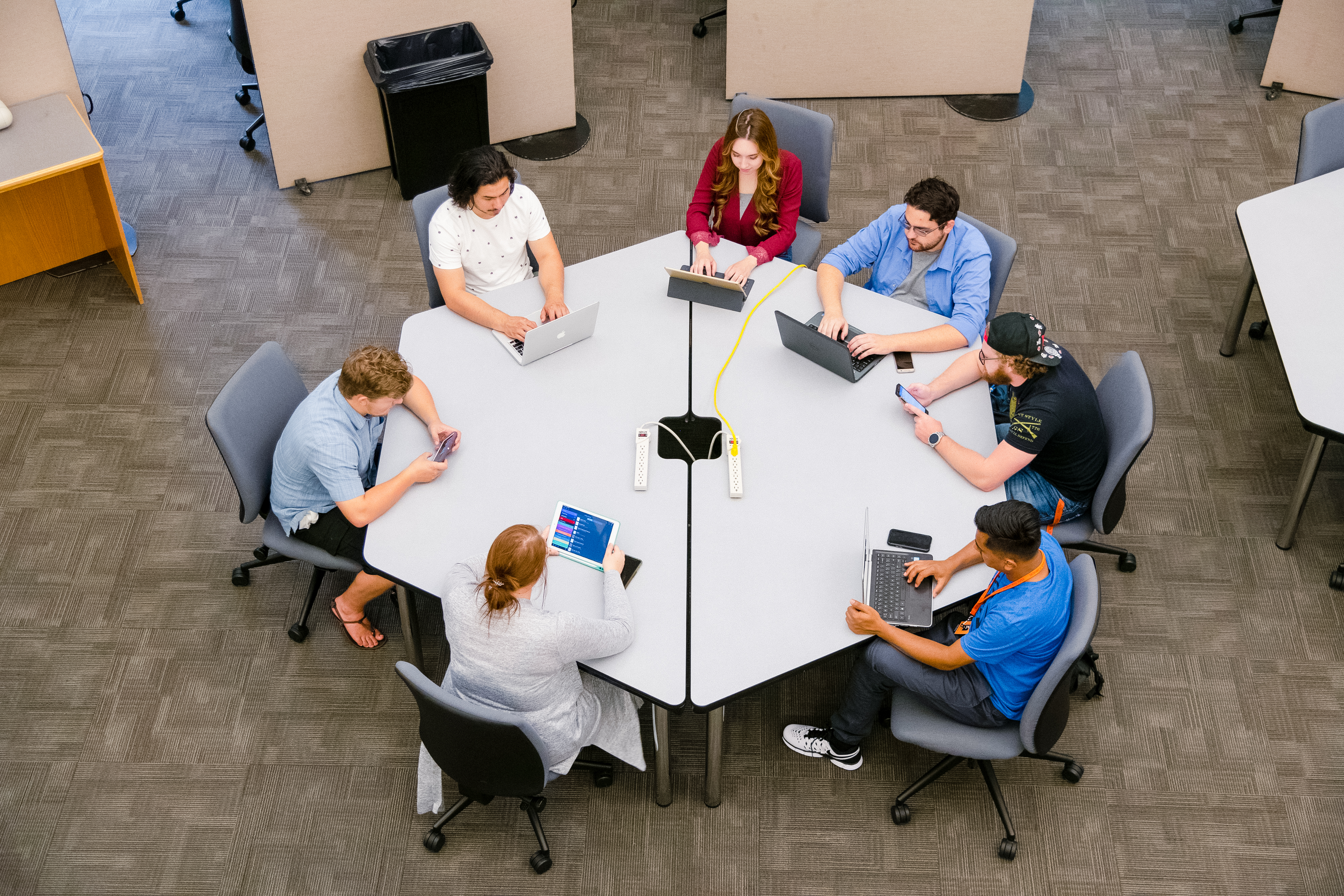 Students sitting around a table.