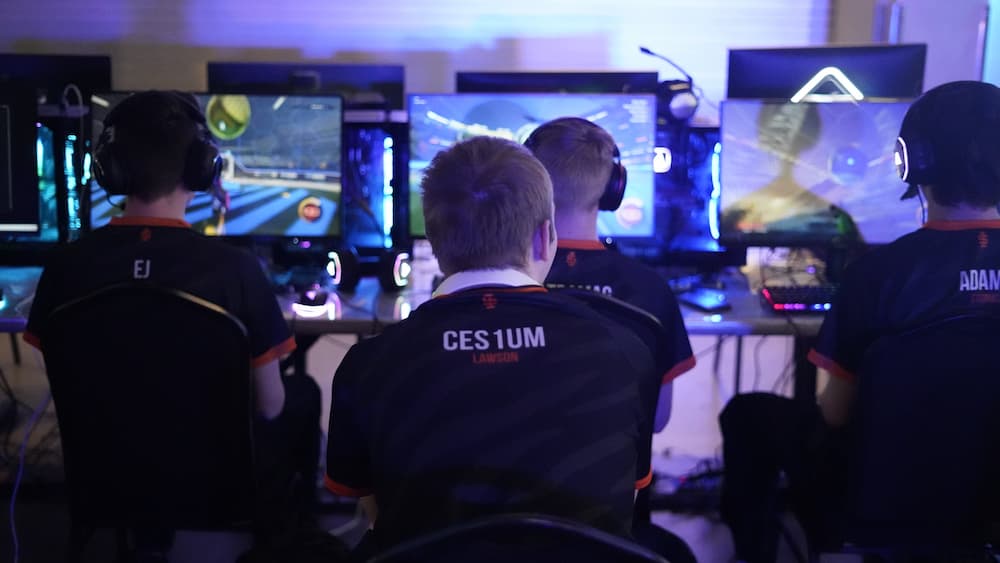 Rear view of players, showcasing jerseys and gamertags
