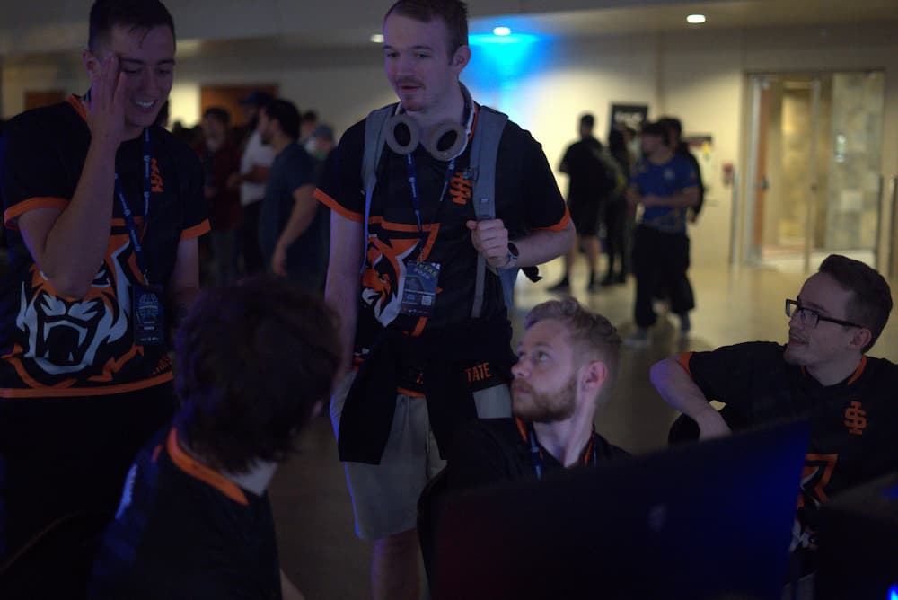 Lighthearted team discussion between matches