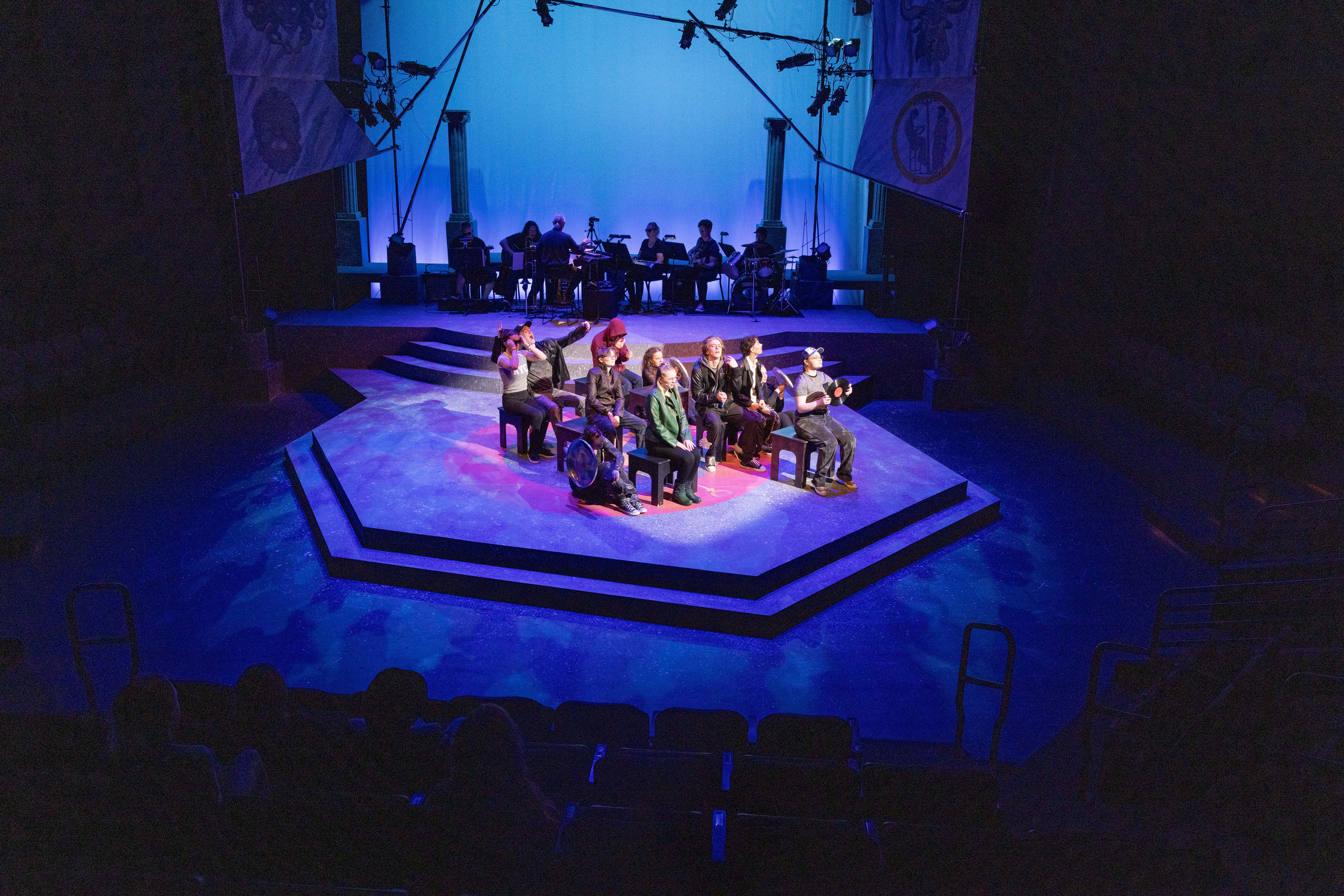 Student actors on stage of the Bistline Theatre