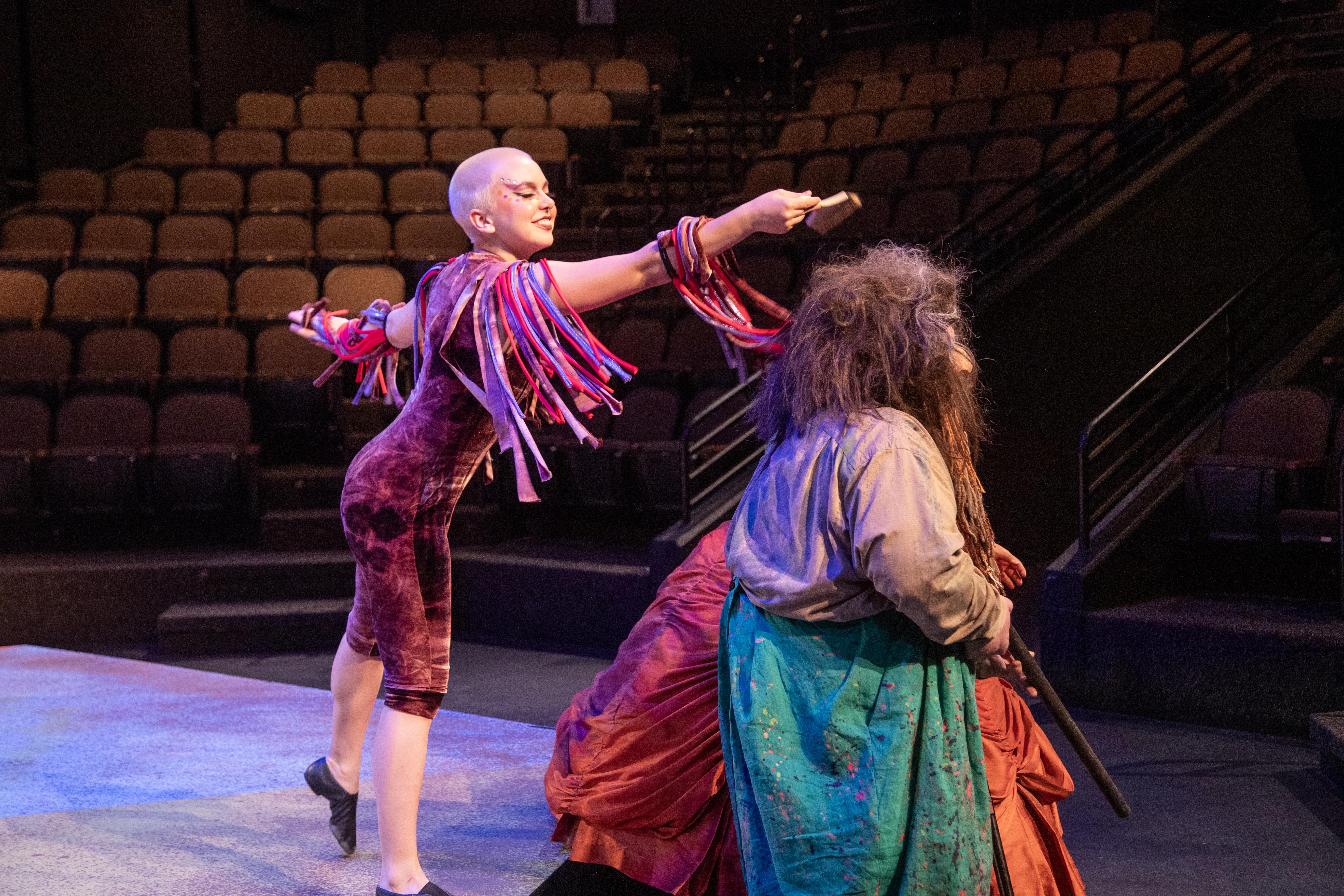 Student actors on stage of the Bistline Theatre