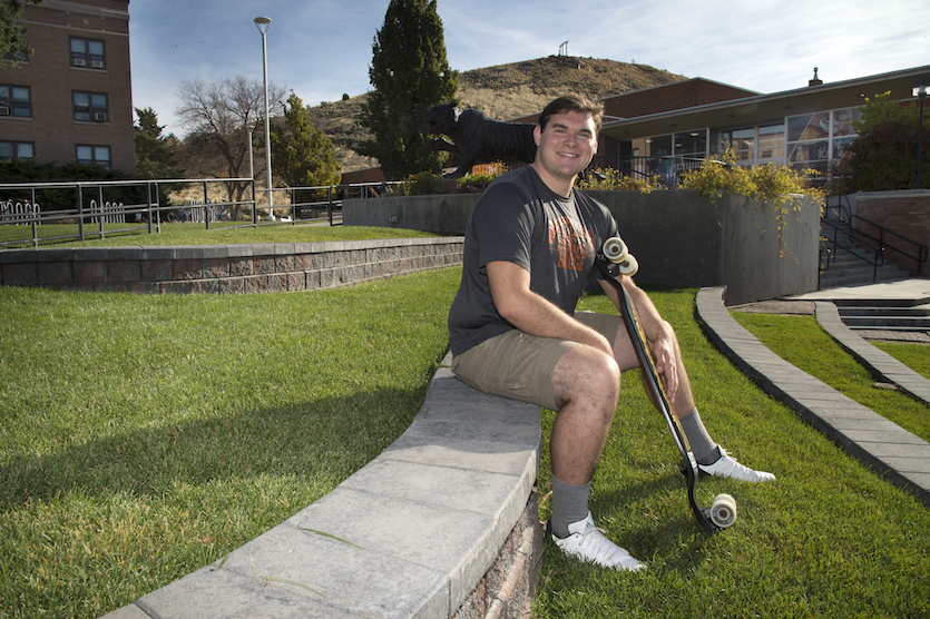 Bengal Bridge student Ethan Moore pictures sitting on Hutchinson Quadrangle.