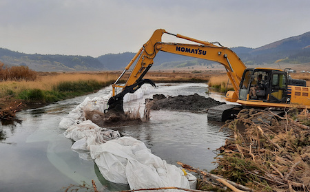 Heavy equipment working on the Blackfoot River