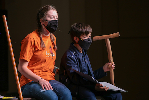 Two children perform opera