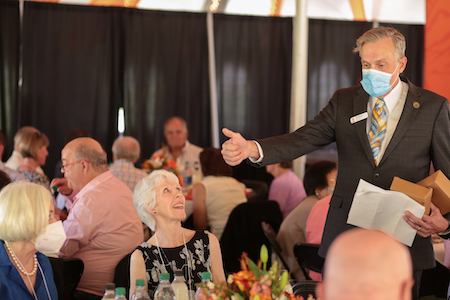 People celebrate at a lunch