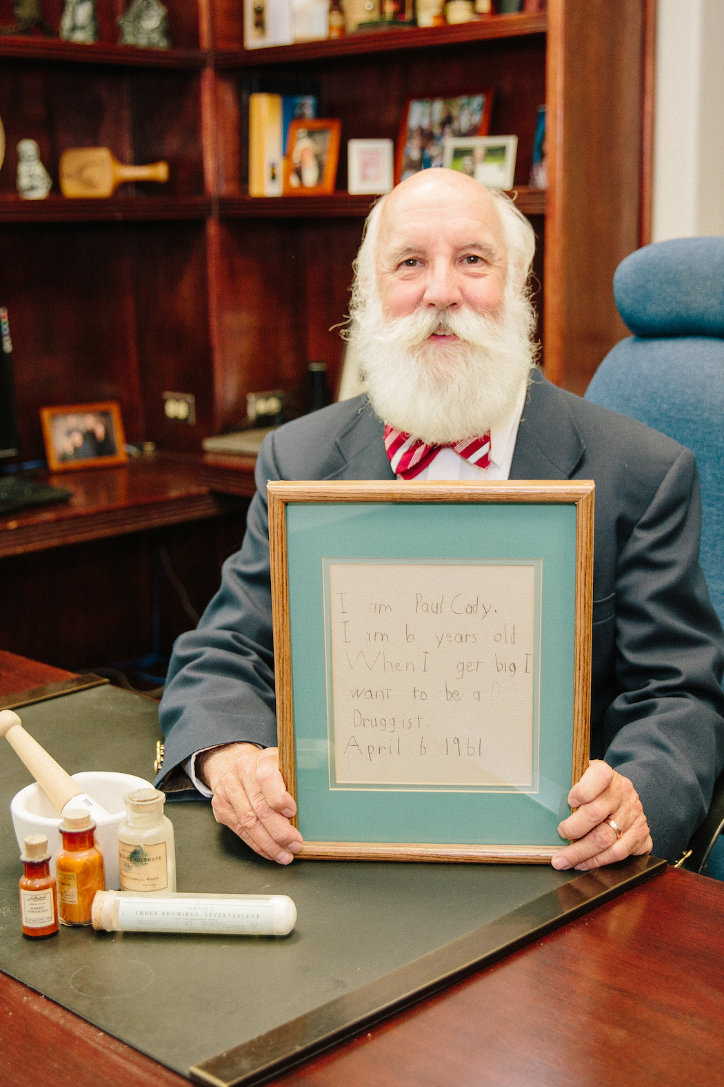 Paul Cady holding sign