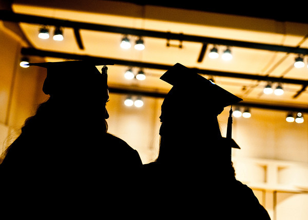 Two students at commencement