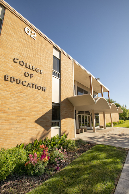 Building with College of Education Sign