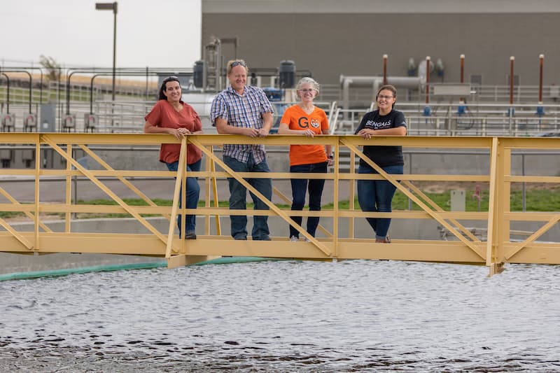 Christi Rowe, pretreatment/laboratory supervisor, Justin bloxham, operations supervisor, Emily Baergen, biology specialist at Idaho State University, and Julia Martin, associate professor of microbiology and biochemistry, pose for a photo at City of Pocatello's Water Pollution Control Plant on Thursday, September 08, 2022.