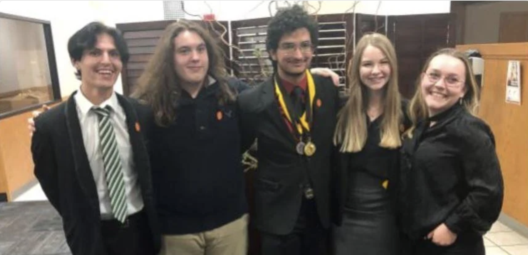 Debate team posing for a photo