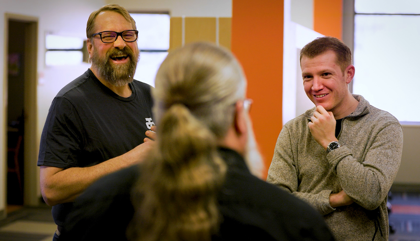 Todd Johnson talks with a student veteran.