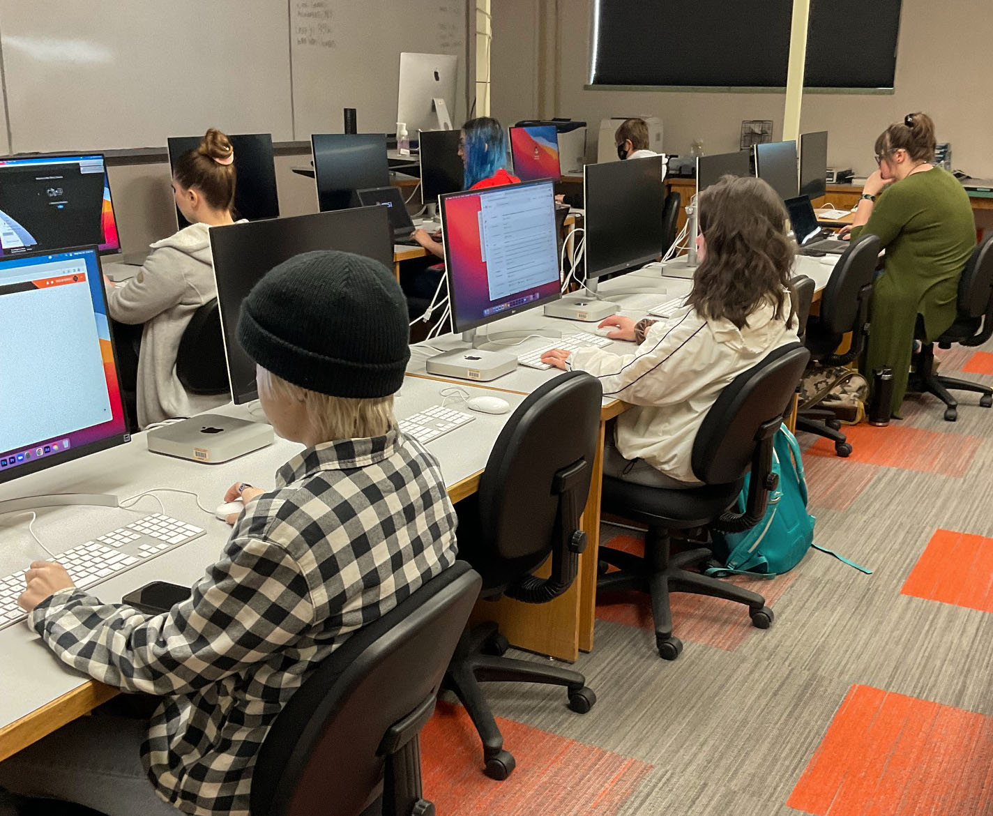 Students at computers in a classroom