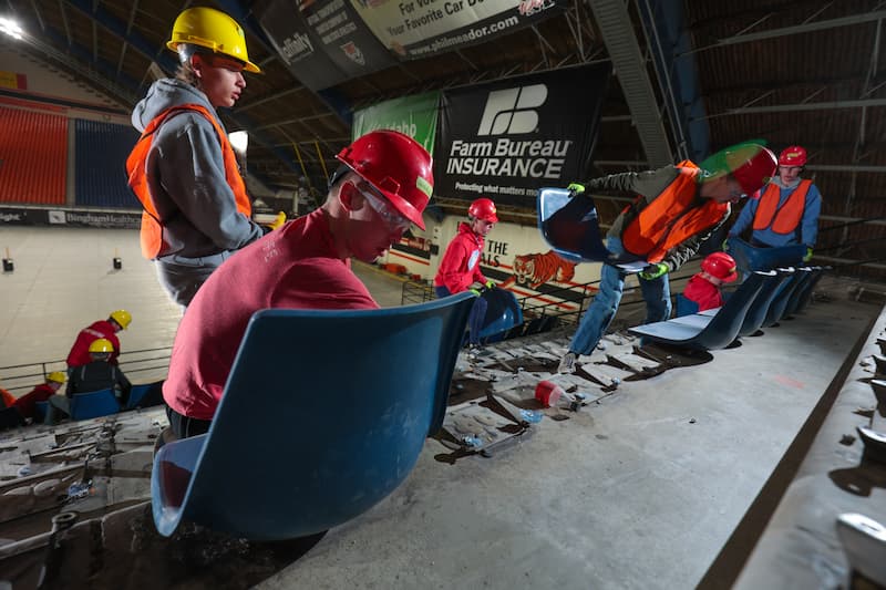 Construction crews removing seats from Holt Arena