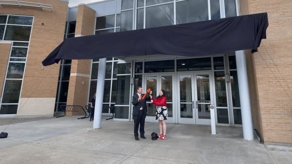 President Kevin Satterlee and Elizabeth Bowen dedicate the Richard L. and Connie S. Bowen Rendezvous Center