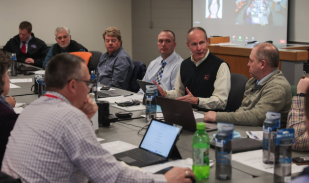 Dr. Geoff Thomas leading a local superintendent meeting at the College of Education