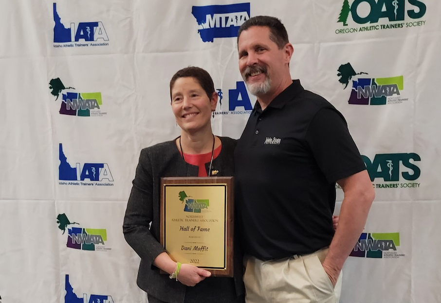 Dani Moffit holding her award