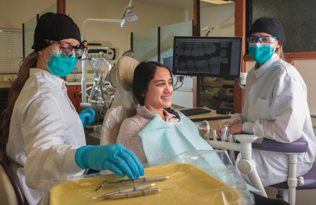 Students work on a patient inside the completely renovated Delta Dental of Idaho Dental Hygiene Clinic
