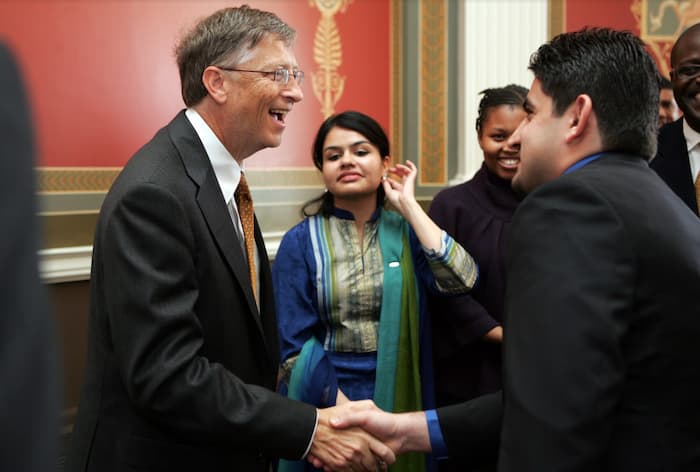 Mustafa Mashal greeting Bill Gates at the Library of Congress in Washington D.C. in 2010.