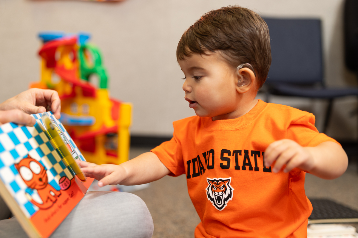 Ethan Estevez plays at the Speech Language Pathology Clinic in Pocatello