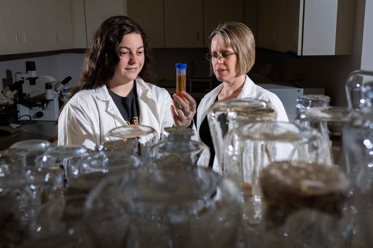Two women work in a laboratory