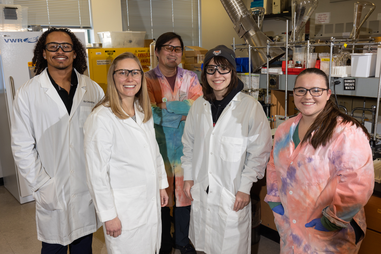 A group of people in lab coats