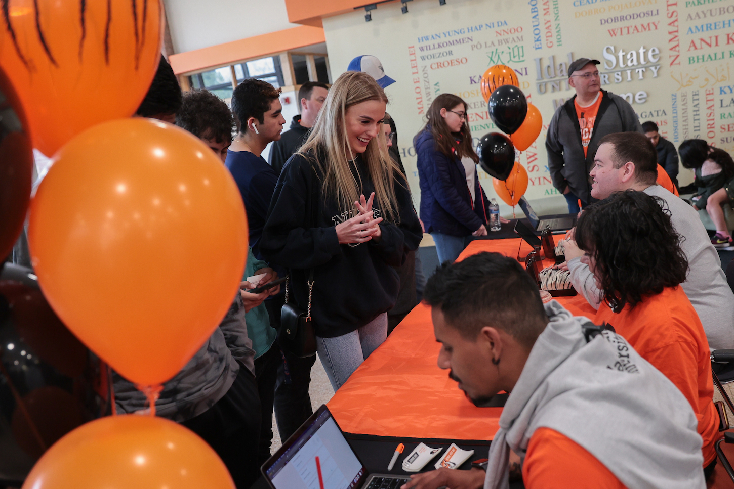 Students at a table with balloons