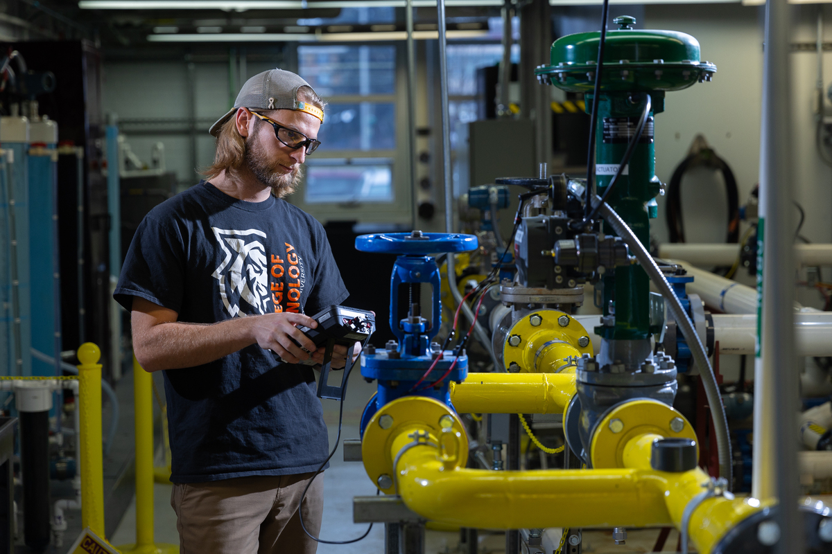 A student in the College of Technology studies instrumentation