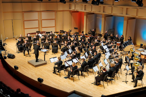 ISU Wind Ensemble and Civic Concert Band on stage at the Jensen Grand Concert Hall