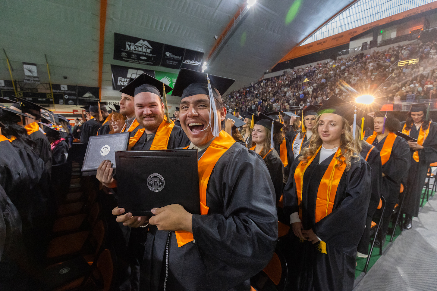 A group of graduates celebrate