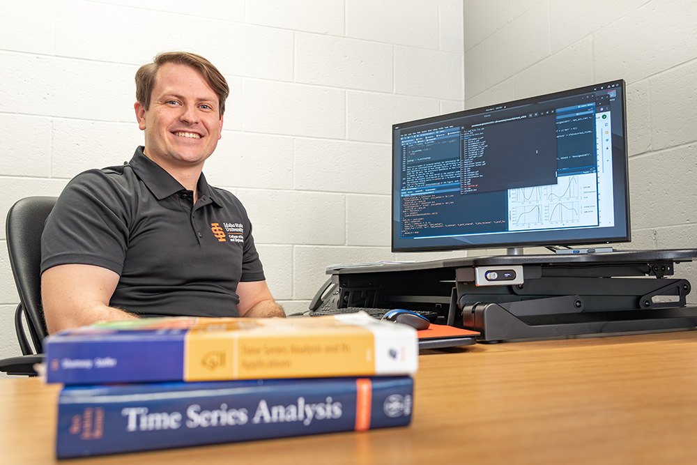 Jesse Wheeler, assistant professor in the mathematics and statistics department at Idaho State University, poses for a photo on ISU’s Pocatello campus.