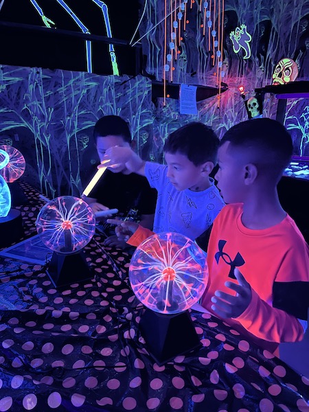 Kids with a black light