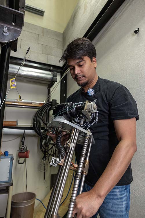 Maruf Anwarul, graduate student, poses for a photo in the Nuclear Engineering Laboratory on Idaho State University’s Pocatello campus.