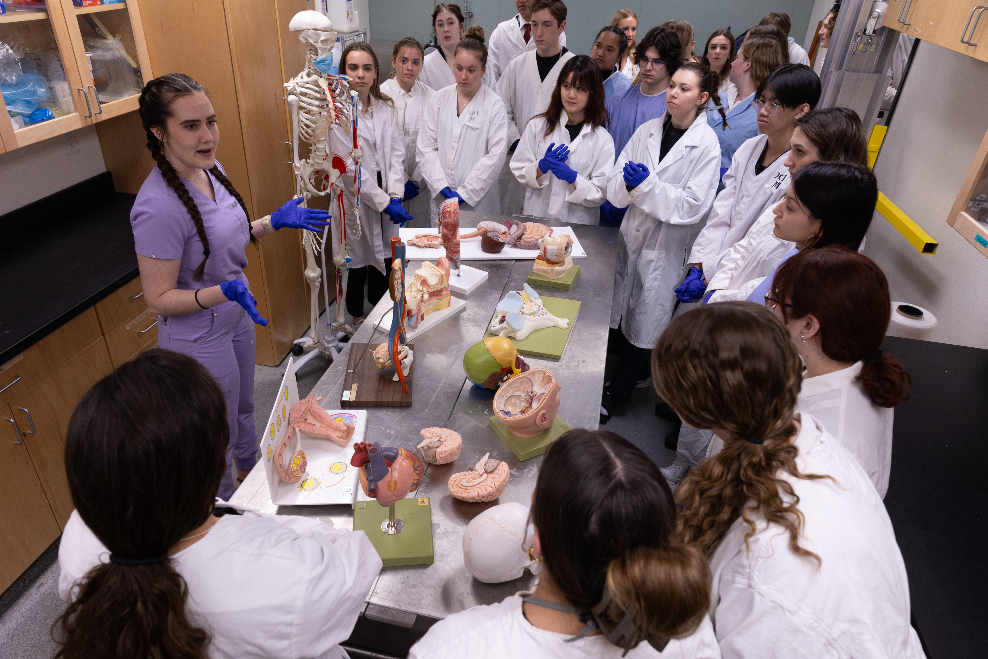 Students view a lab demonstration