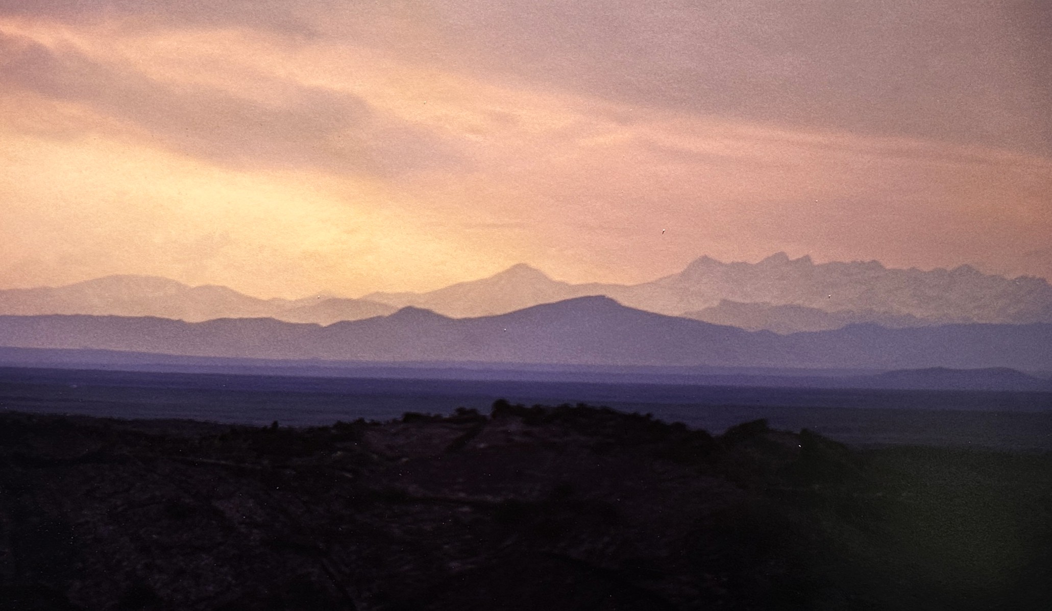 Photo Caption: Sunset over Craters of the Moon, photographed by Roger Boe.