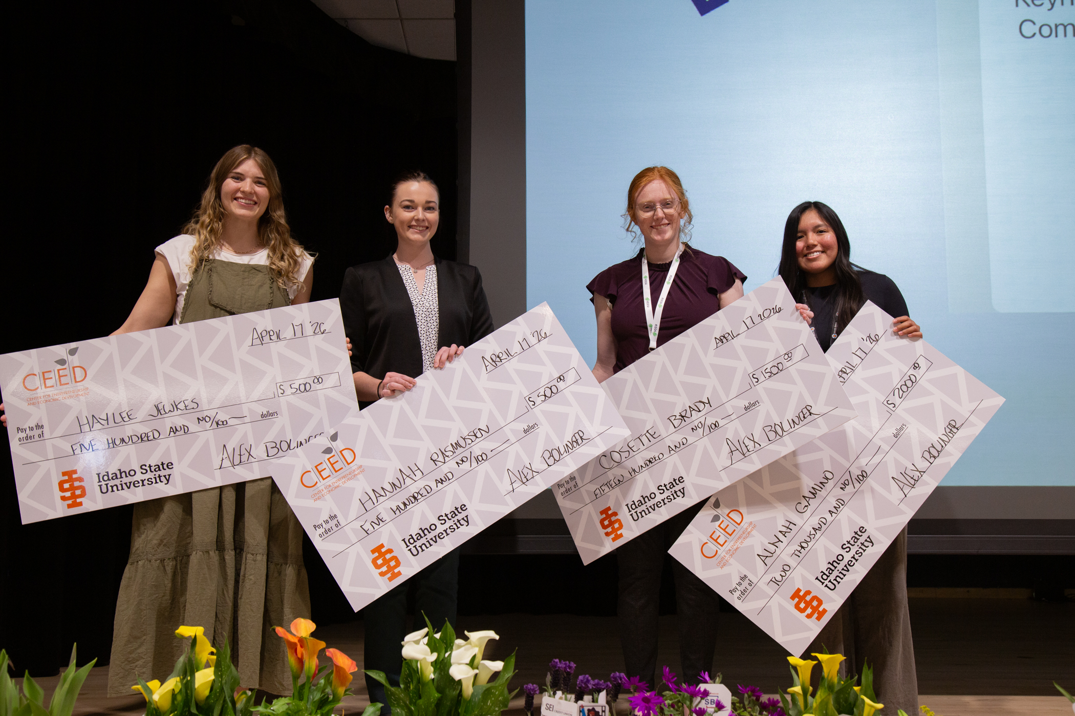 Participants in the Young Entrepreneur Pitch Off pose with their checks at the 2026 Women’s Business Symposium.