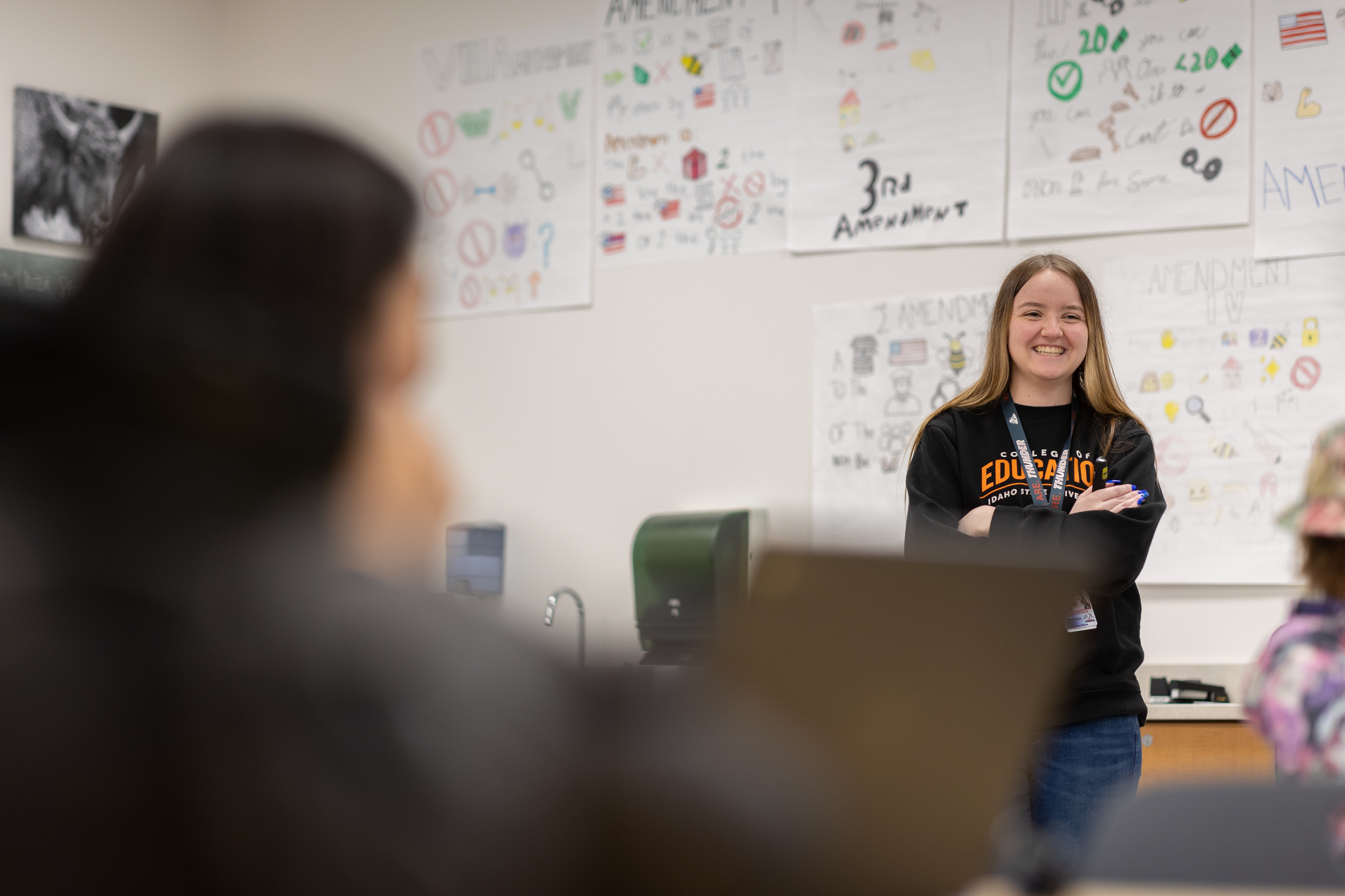 A teacher in front of a classroom