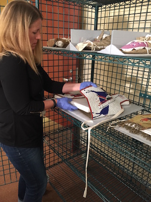 Bridgett Guild prepares a vest for 3-D photo capture. 