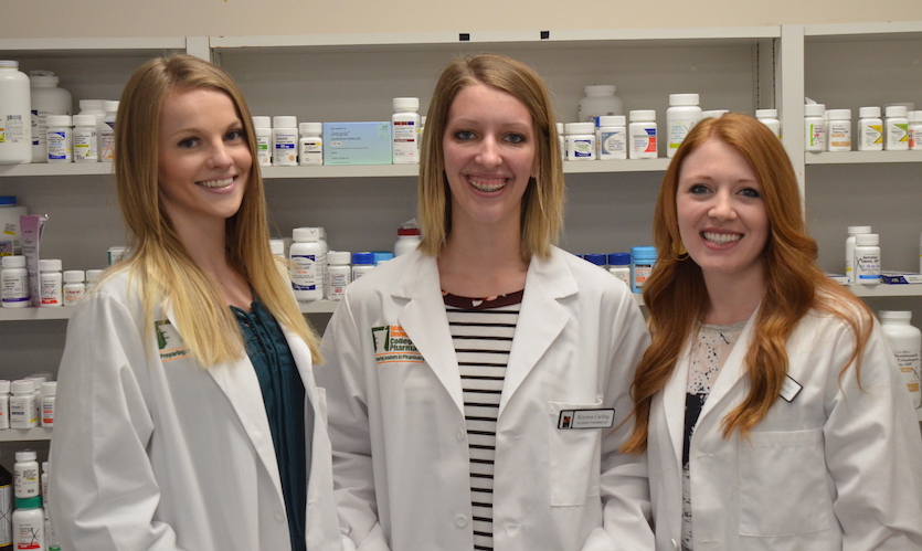 ISU pharmacy students Erin Quigg, Kryston Carling and Kayla Brawley shown with jackets on.