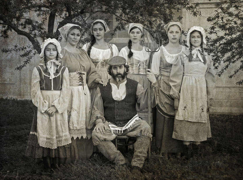 A photo of seven of the cast of 