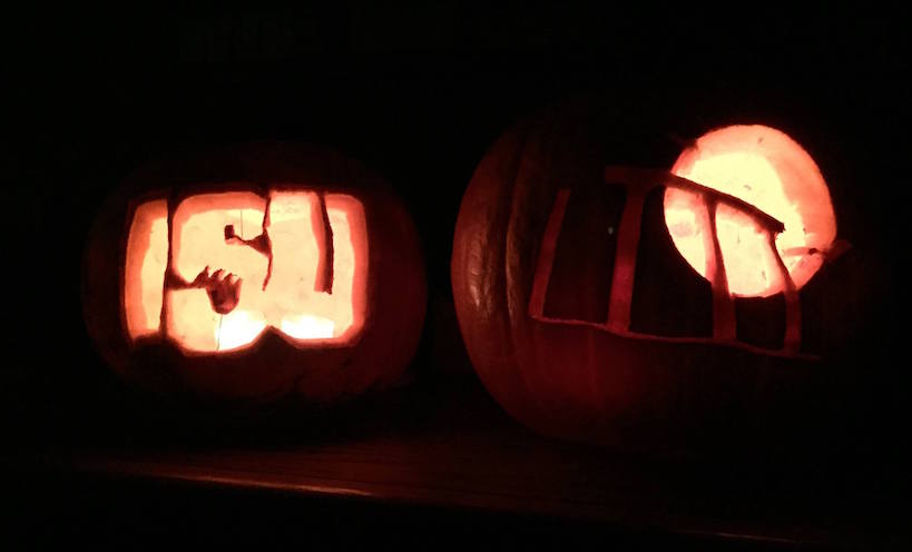 Two Halloween pumpkins, one with