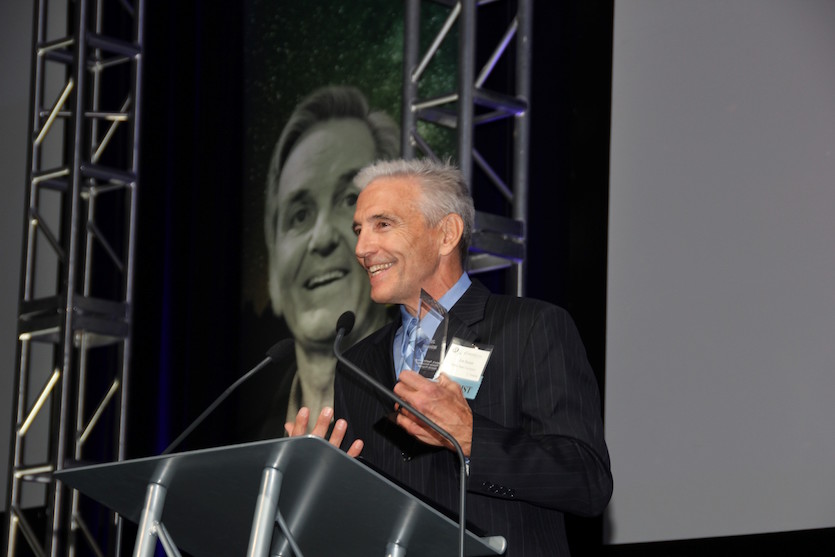 Photo of Jon Stoner at the podium during the Idaho Innovation Awards