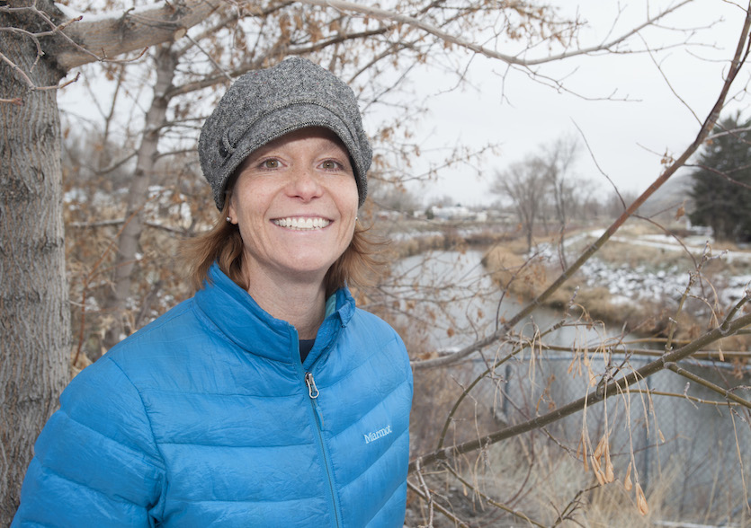Photo of Donna Lybecker with Portneuf River in the background.