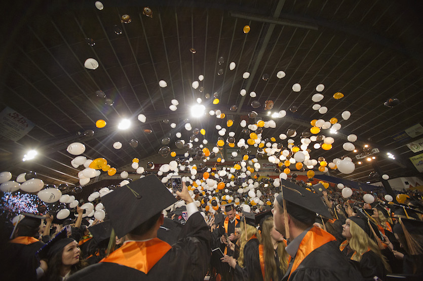 Commencement balloons dropping over crowd