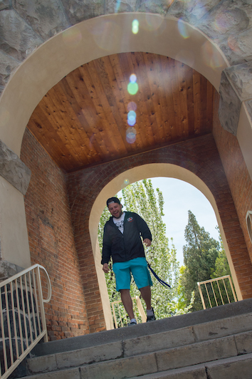 A student walking through the Swanson Arch at 2018 event.